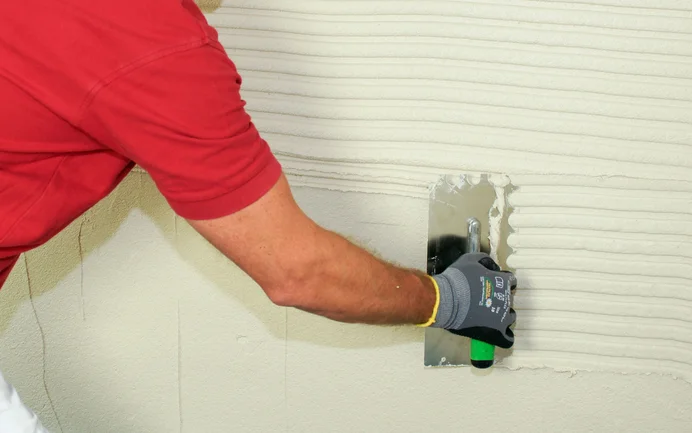 AS 2-in-1 lijm + pleister aanbrengen (alternatief: Kalkin kalkpleister wit of Kalkin kalkplamuur W eroverheen aanbrengen)
