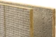 Isolatieplaat-minerale wol dagkant 035 - Detail van de voorkant van de isolatieplaat en de kleefzijde.
